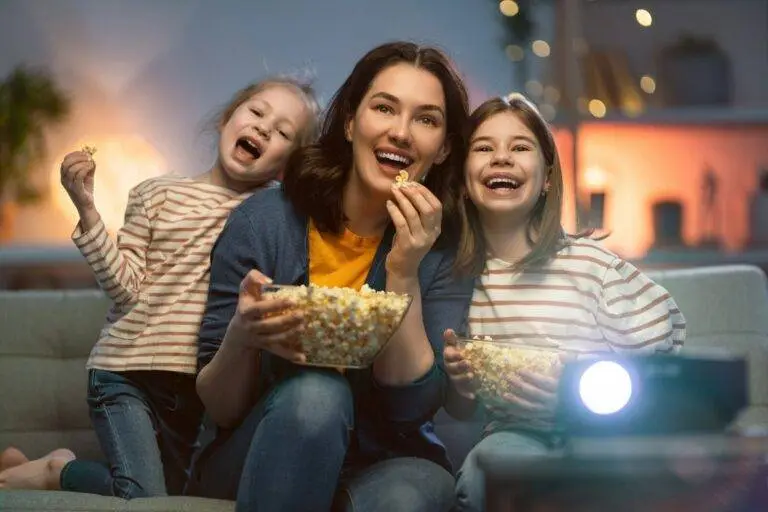 a group of women eating pizza