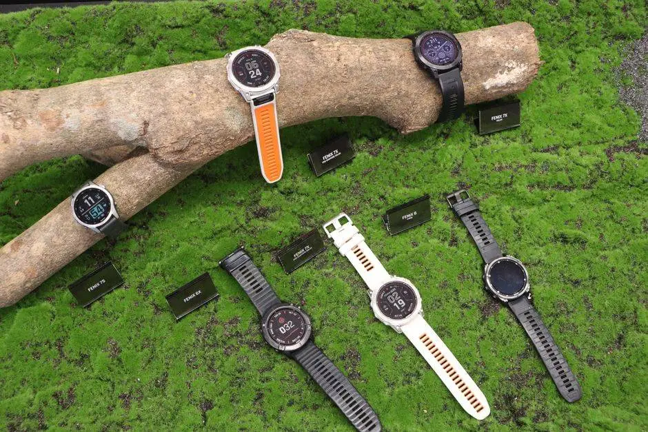 Array of smartwatches showcased on a moss-covered display, blending technology with nature.